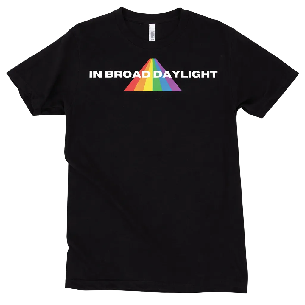 Black t-shirt with 'In Broad Daylight' and rainbow triangle design on a white background